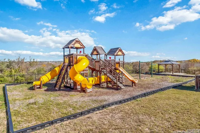 a view of a houses with swimming pool
