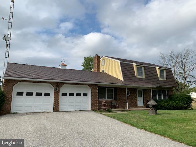155 Farm Valley Road Wellsville, PA 17365 - Photo 2 of 31 a front view of a house with garden