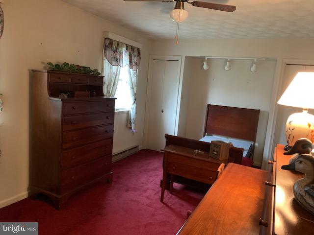 155 Farm Valley Road Wellsville, PA 17365 - Photo 23 of 31 a view of workspace with wooden floor stairs and furniture