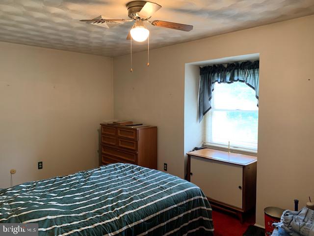 155 Farm Valley Road Wellsville, PA 17365 - Photo 25 of 31 a bedroom with a bed and a window