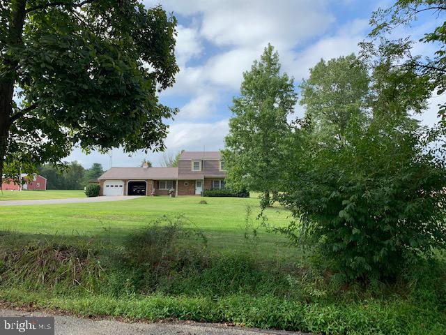 155 Farm Valley Road Wellsville, PA 17365 - Photo 27 of 31 a view of a big yard with plants and large trees