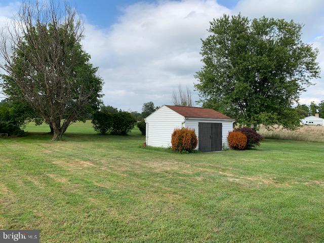 155 Farm Valley Road Wellsville, PA 17365 - Photo 7 of 31 a wooden house with a yard