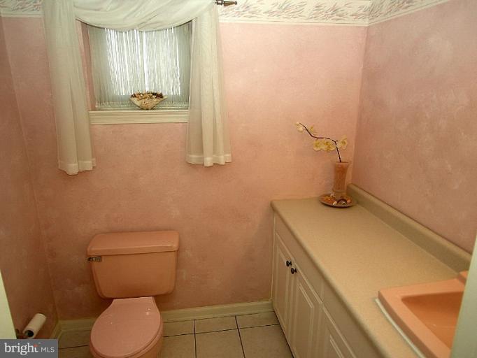 1204 Smith Village Road Silver Spring, MD 20904 - Photo 9 of 17 a bathroom with a sink and a toilet