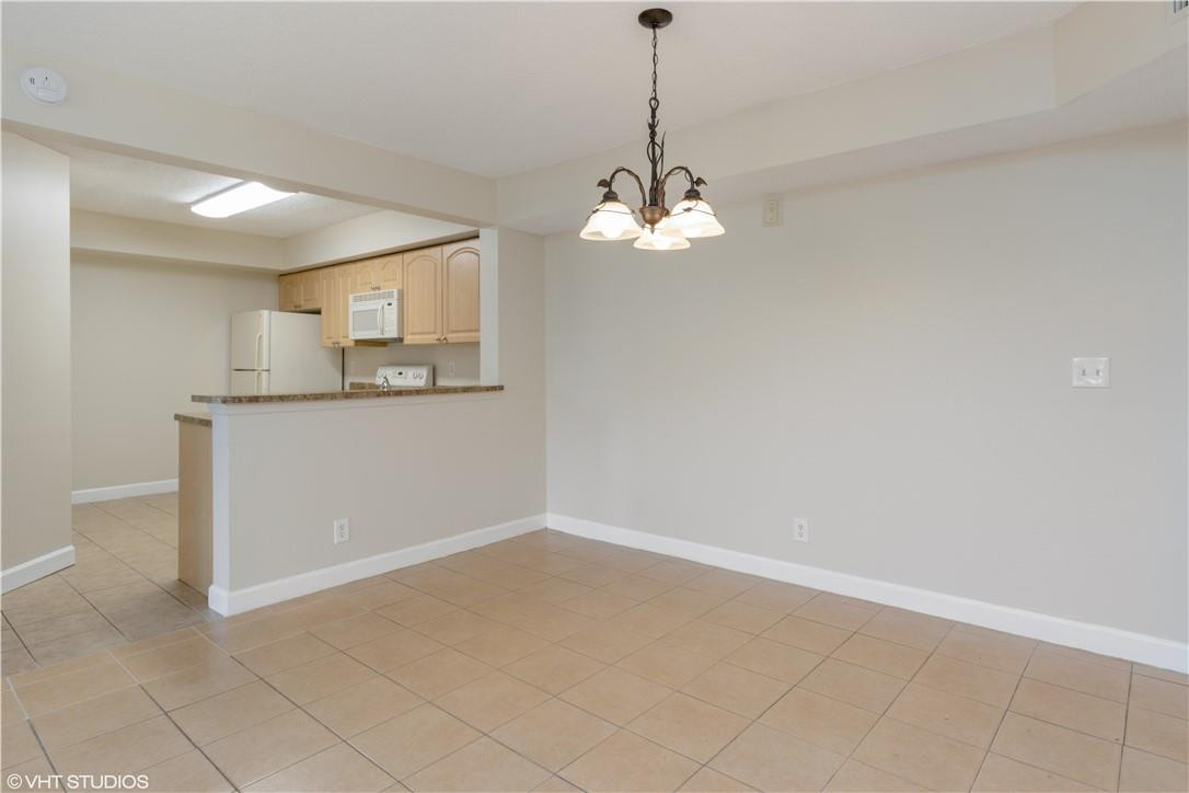 5641 Riverside Drive, Unit 202B1 Coral Springs, FL 33067 - Photo 7 of 15 Kitchen/Dining Rm