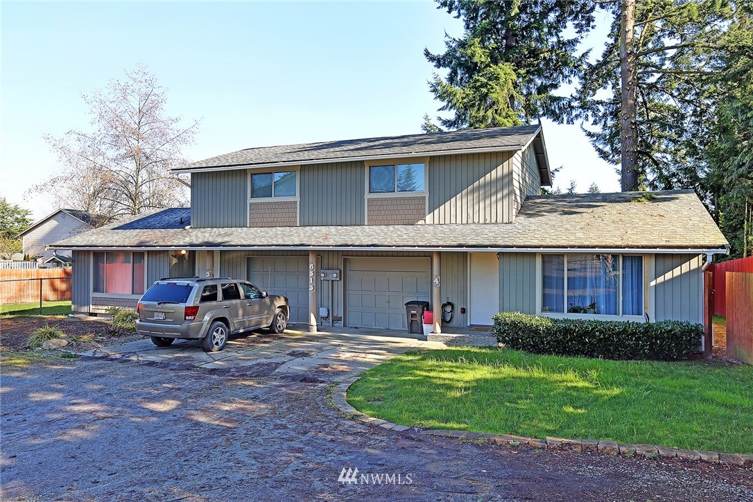 6515 Cady Road Everett, WA 98203 - Photo 1 of 15 a view of a yard in front of a house