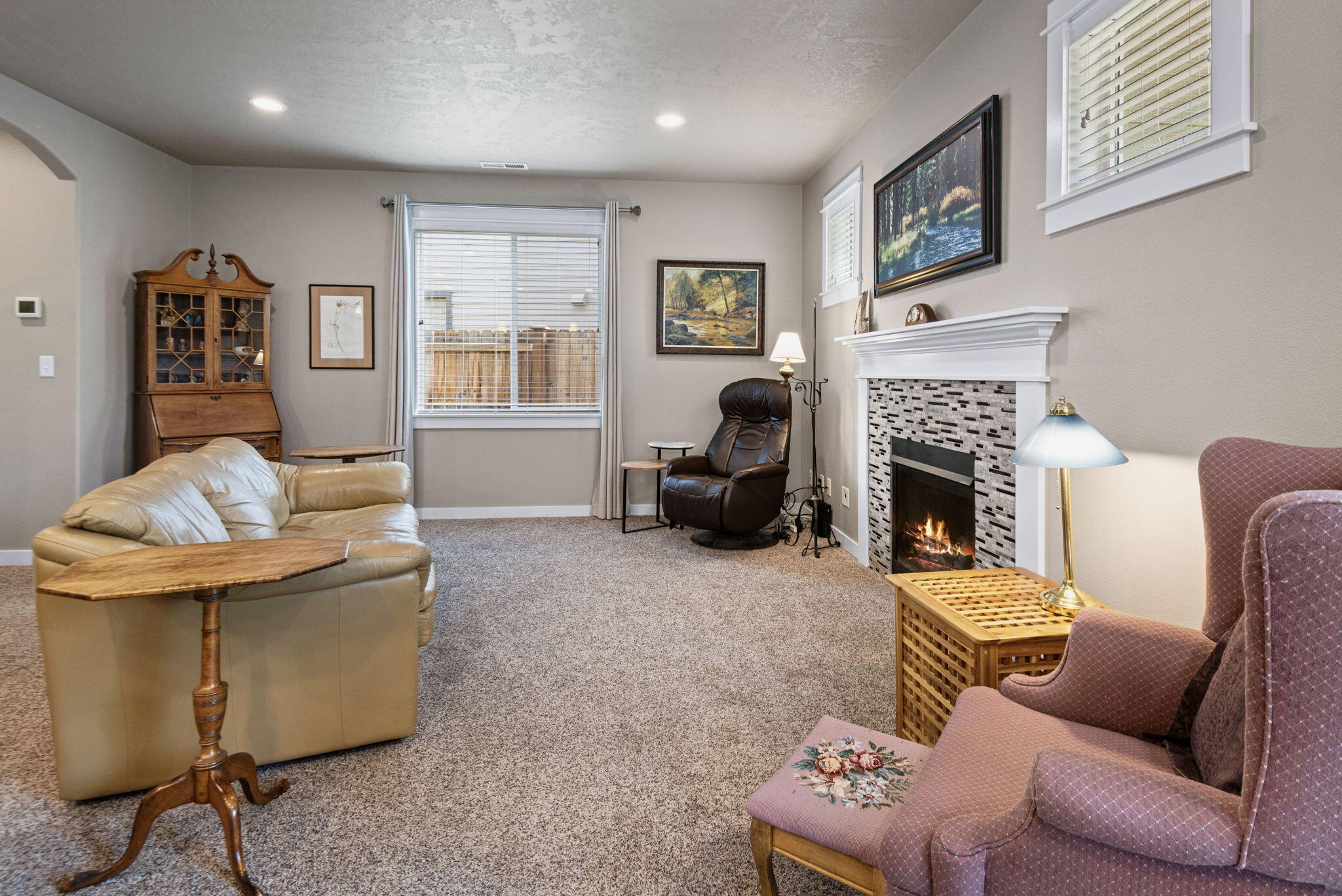 715 Brooks Camp Road Sisters, OR 97759 - Photo 4 of 25 a living room with furniture and a fireplace