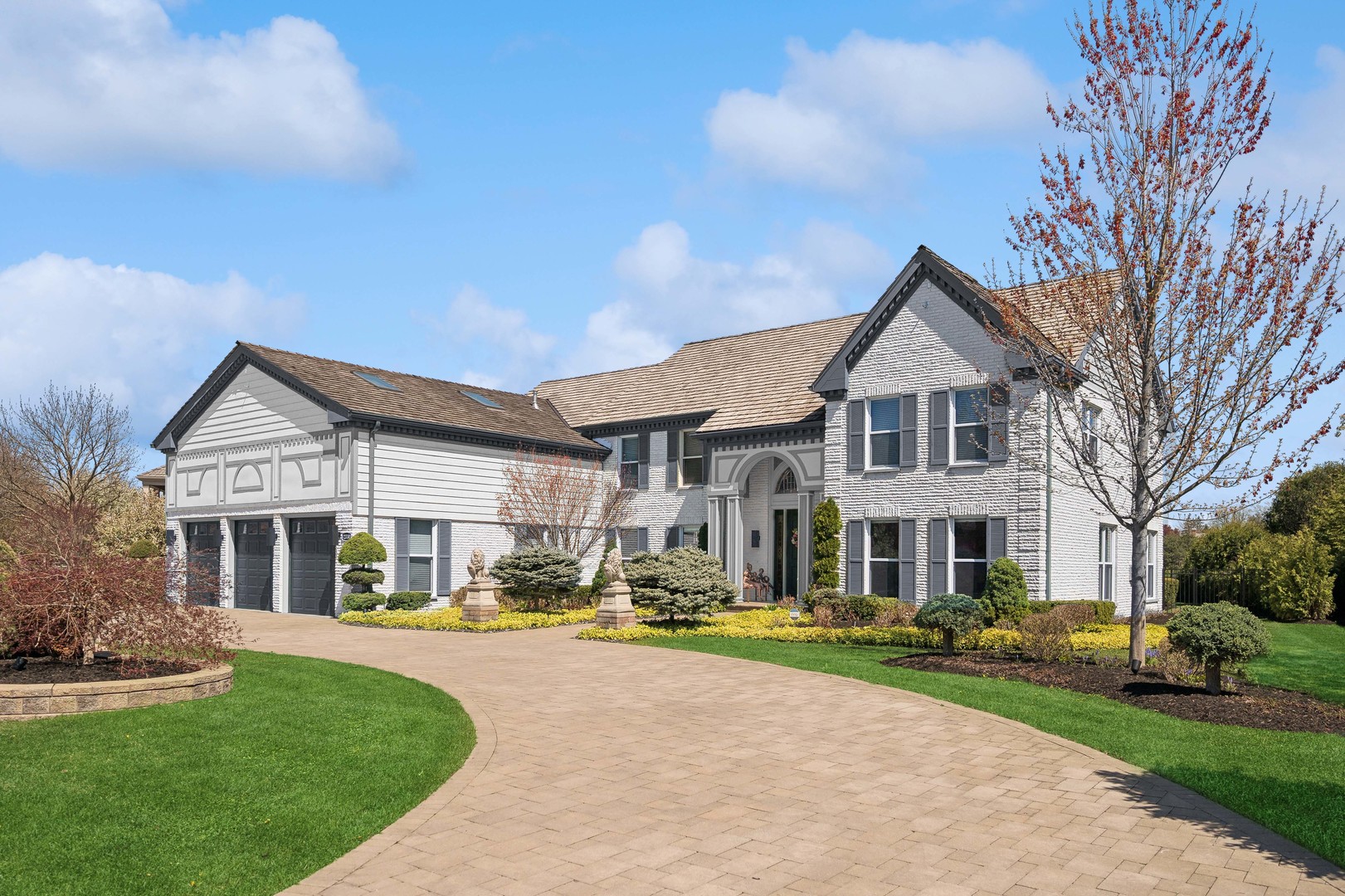 2330 Mohawk Lane Glenview, IL 60026 - Photo 1 of 1 a front view of a house with garden and porch