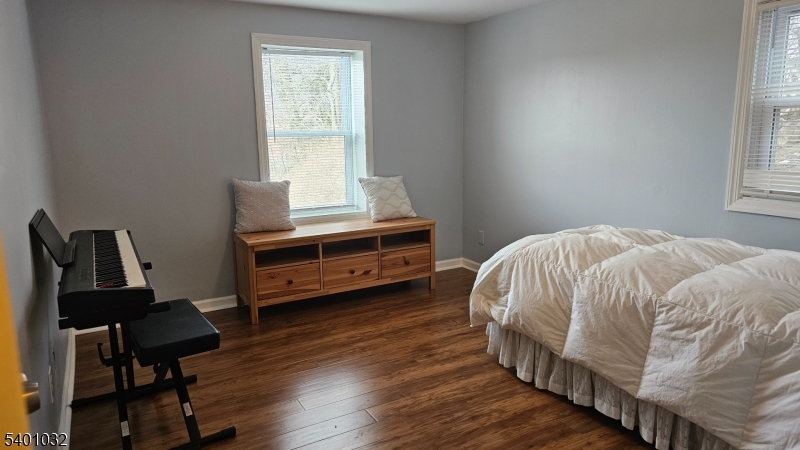 12 Ford Road Landing, NJ 07850 - Photo 14 of 32 a bed room with a bed and a window
