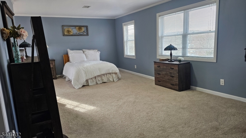 12 Ford Road Landing, NJ 07850 - Photo 15 of 32 a bedroom with a bed and a window