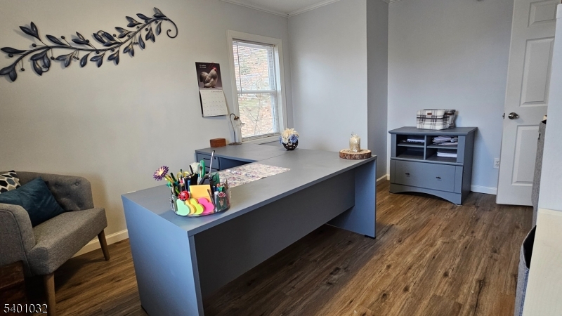 12 Ford Road Landing, NJ 07850 - Photo 23 of 32 a living room with kitchen island furniture and a wooden floor