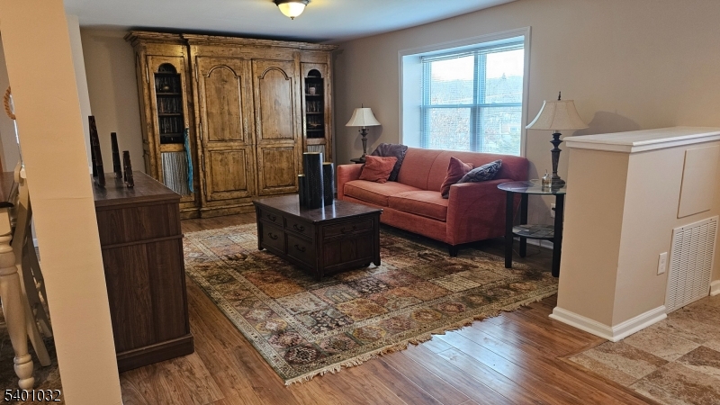 12 Ford Road Landing, NJ 07850 - Photo 3 of 32 a living room with furniture and a gate