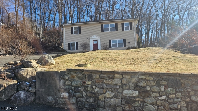 12 Ford Road Landing, NJ 07850 - Photo 32 of 32 a view of a house with snow on the side of the road