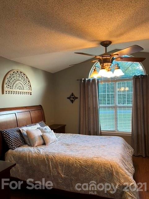 409 Chaney Road Monroe, NC 28110 - Photo 13 of 23 a bedroom with a bed and a window