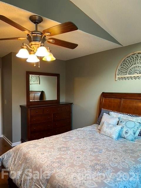 409 Chaney Road Monroe, NC 28110 - Photo 15 of 23 a bedroom with a bed and a mirror
