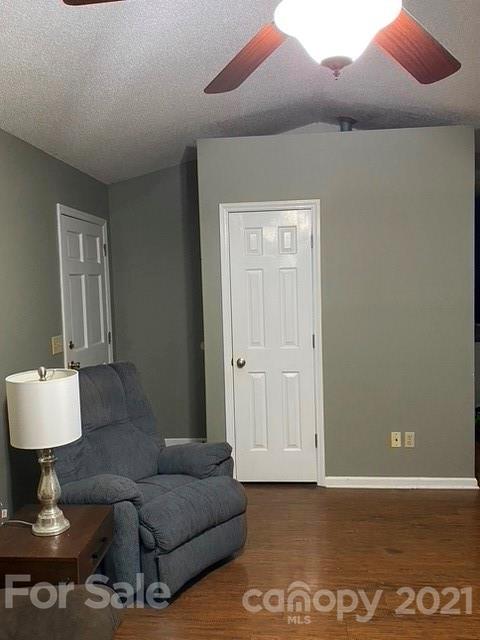 409 Chaney Road Monroe, NC 28110 - Photo 5 of 23 a living room with furniture and a lamp
