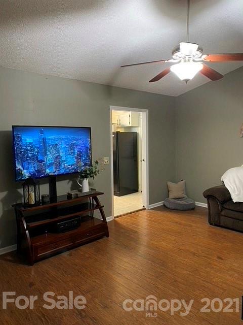 409 Chaney Road Monroe, NC 28110 - Photo 7 of 23 a living room with furniture and a chandelier