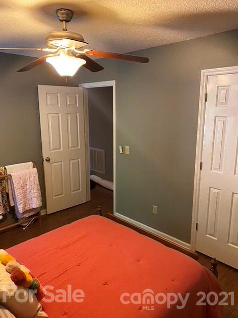 409 Chaney Road Monroe, NC 28110 - Photo 9 of 23 a view of an empty room and window