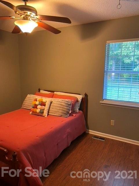 409 Chaney Road Monroe, NC 28110 - Photo 10 of 23 a bedroom with a bed and a window