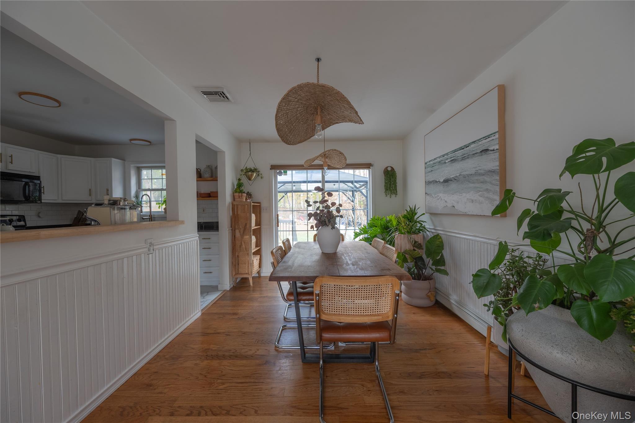 13 Hamilton Road Pine Bush, NY 12566 - Photo 13 of 46 a dining room with furniture and a potted plant