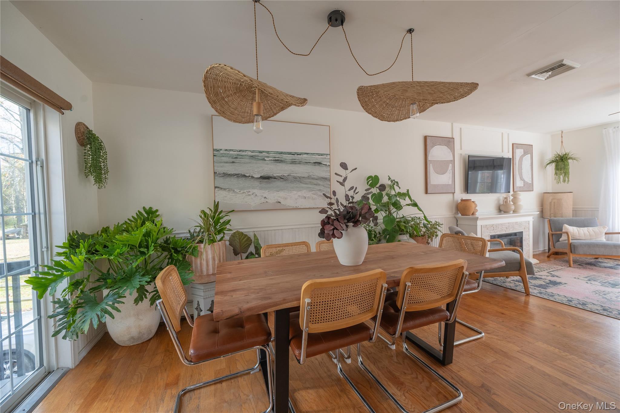 13 Hamilton Road Pine Bush, NY 12566 - Photo 16 of 46 a dining room with wooden floor a chandelier a wooden table and chairs
