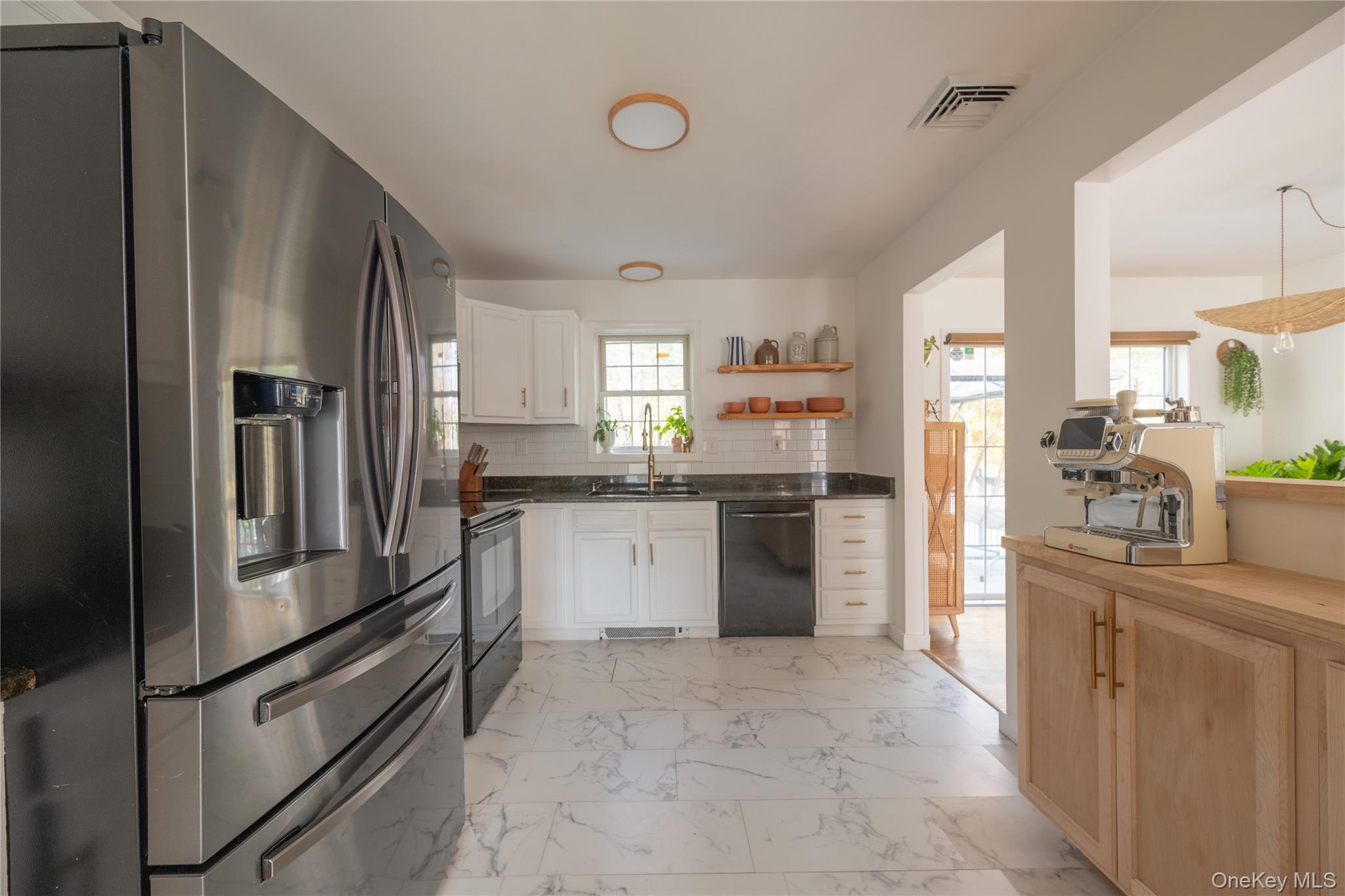 13 Hamilton Road Pine Bush, NY 12566 - Photo 20 of 46 a kitchen with a refrigerator and cabinets