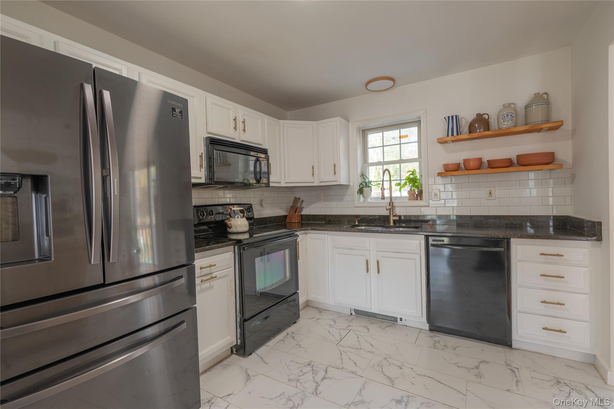 13 Hamilton Road Pine Bush, NY 12566 - Photo 22 of 46 a kitchen with granite countertop cabinets stainless steel appliances and window