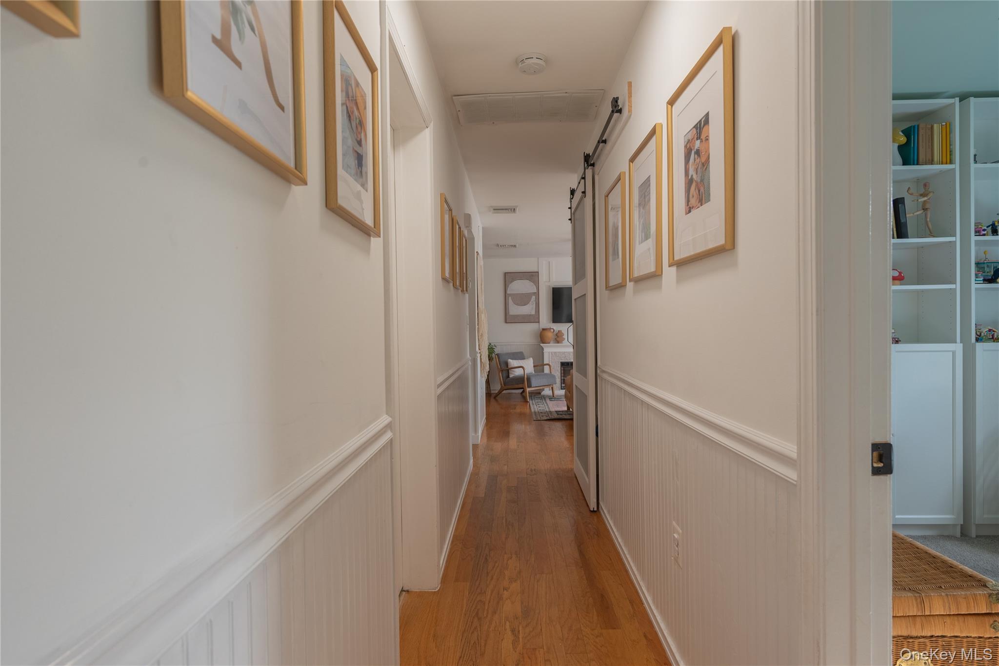 13 Hamilton Road Pine Bush, NY 12566 - Photo 23 of 46 a view of a hallway with wooden floor and staircase