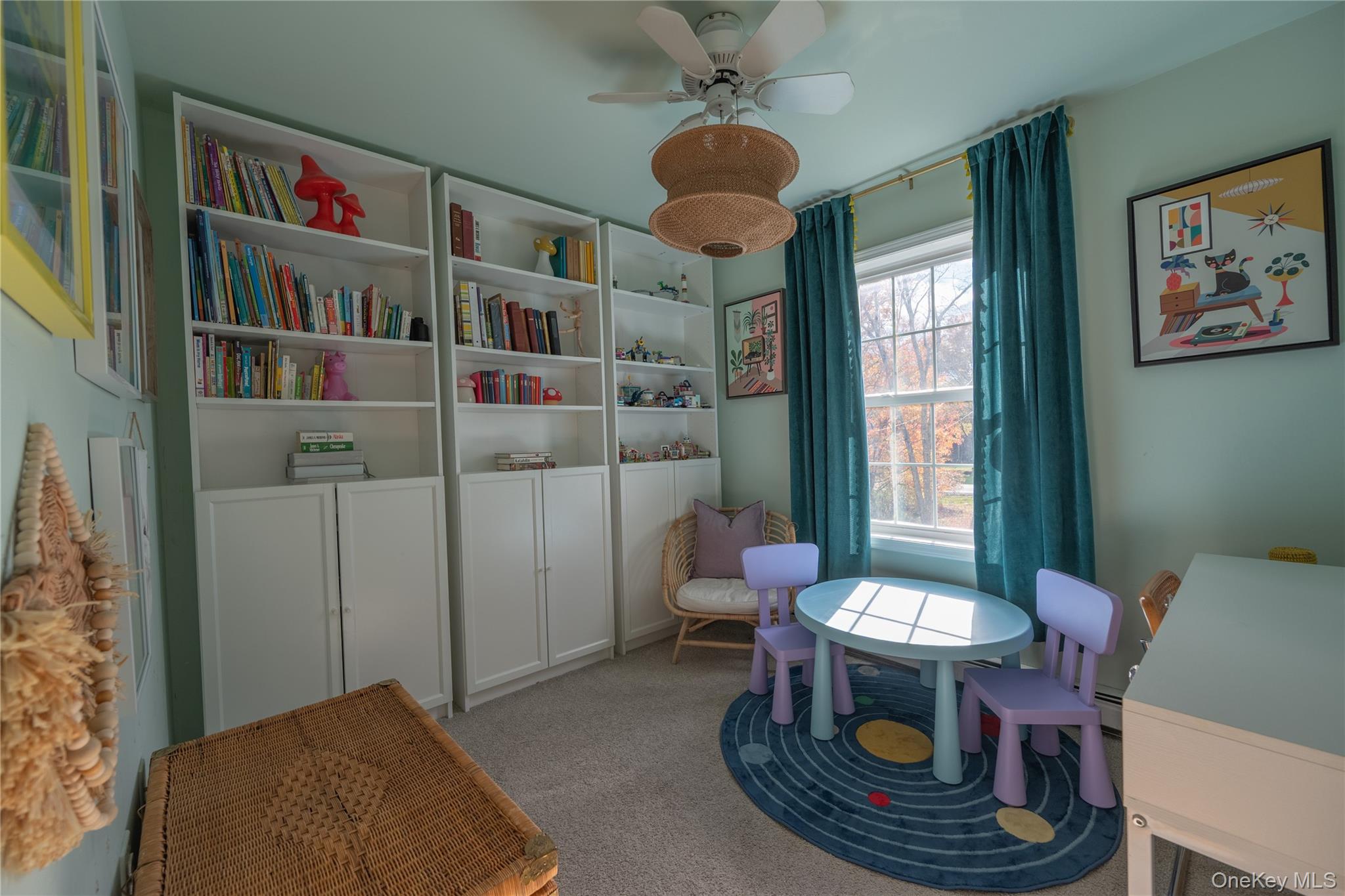 13 Hamilton Road Pine Bush, NY 12566 - Photo 24 of 46 a living room with furniture and a book shelf