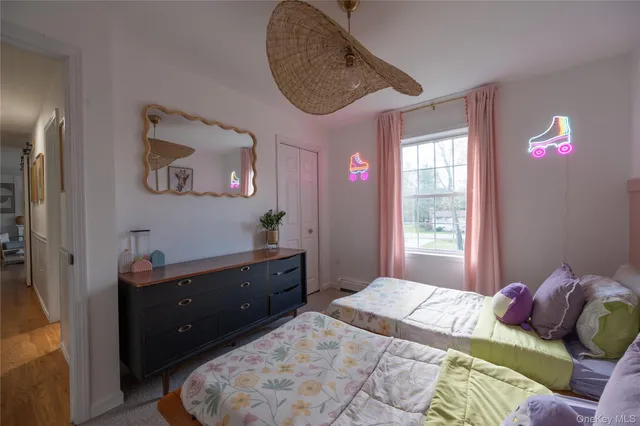 a bed room with a bed and a window