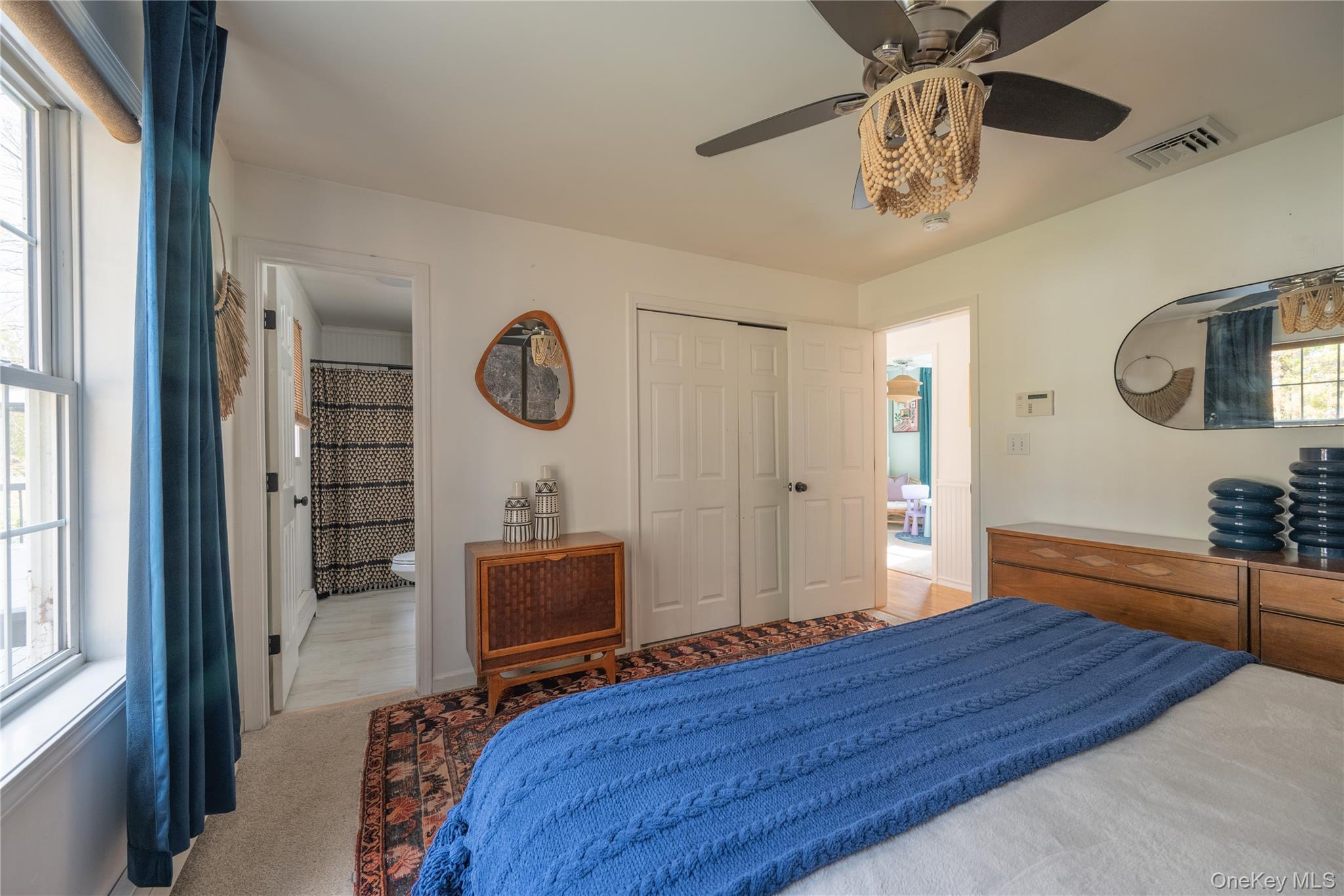 13 Hamilton Road Pine Bush, NY 12566 - Photo 34 of 46 a bedroom with a bed and a chandelier