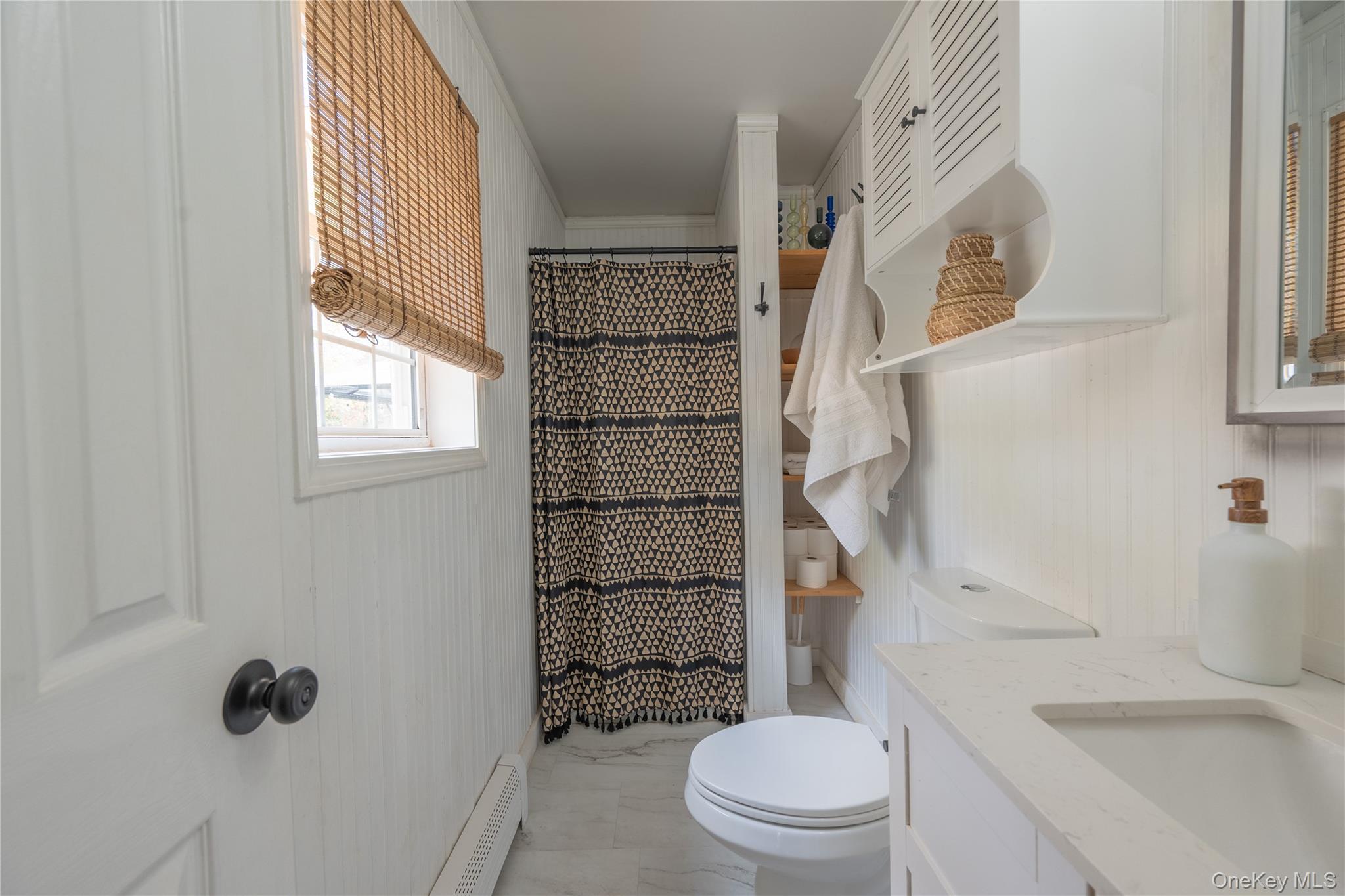 13 Hamilton Road Pine Bush, NY 12566 - Photo 36 of 46 a bathroom with a toilet a sink and a shower