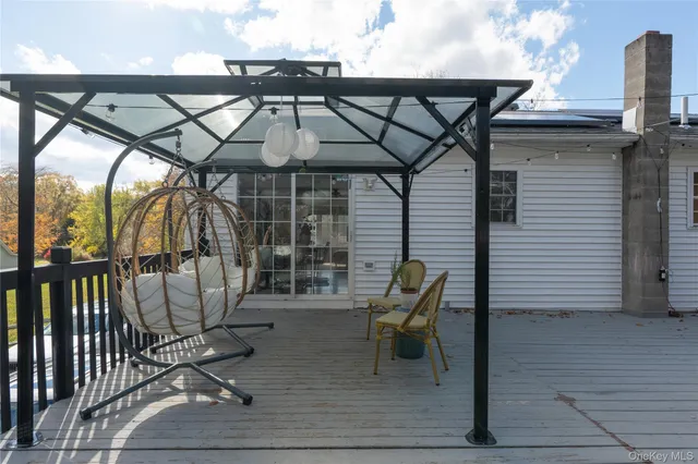 deck with table and chairs