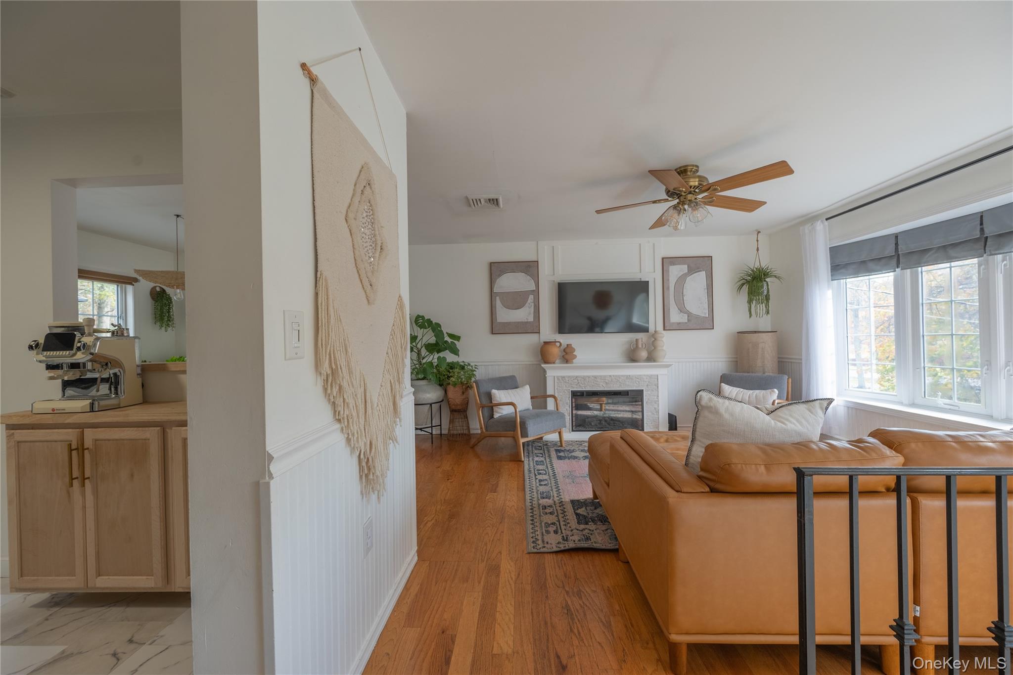 13 Hamilton Road Pine Bush, NY 12566 - Photo 7 of 46 a living room with furniture a fireplace and a flat screen tv