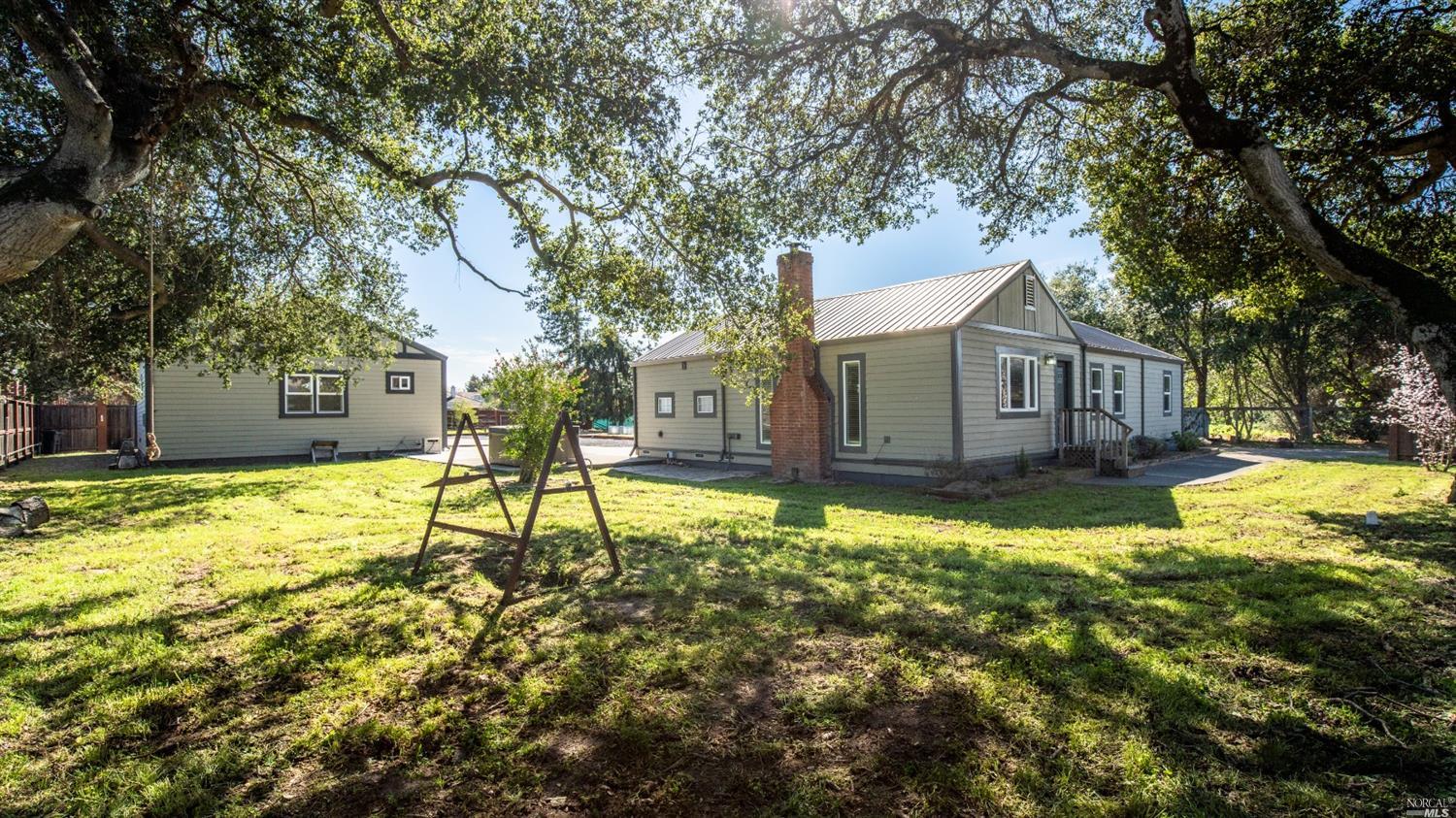 a view of a house with swimming pool