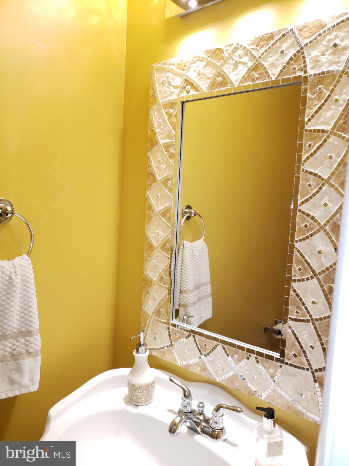 8736 Ridge Hollow Court Springfield, VA 22152 - Photo 40 of 57 HALF BATHROOM MAIN LEVEL