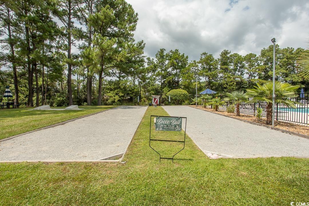 3255 Pecan Trail Murrells Inlet, SC 29576 - Photo 34 of 35 View of property's community featuring a lawn