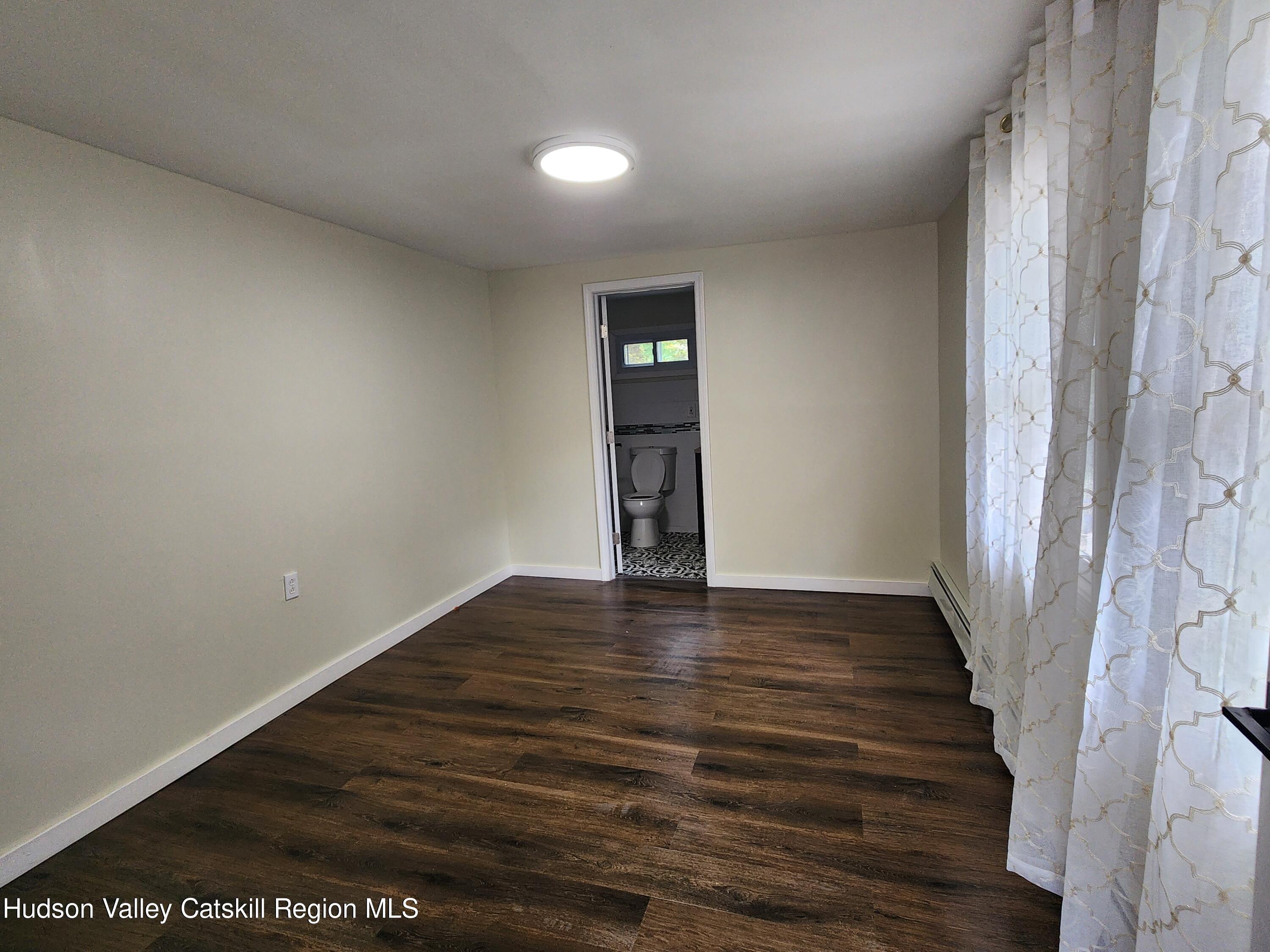 672 Springtown Road Tillson, NY 12486 - Photo 12 of 20 springton bedroom with bathroom