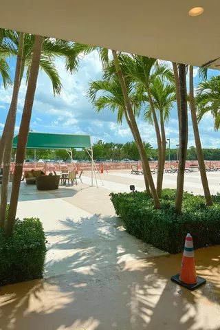 a view of swimming pool with a patio