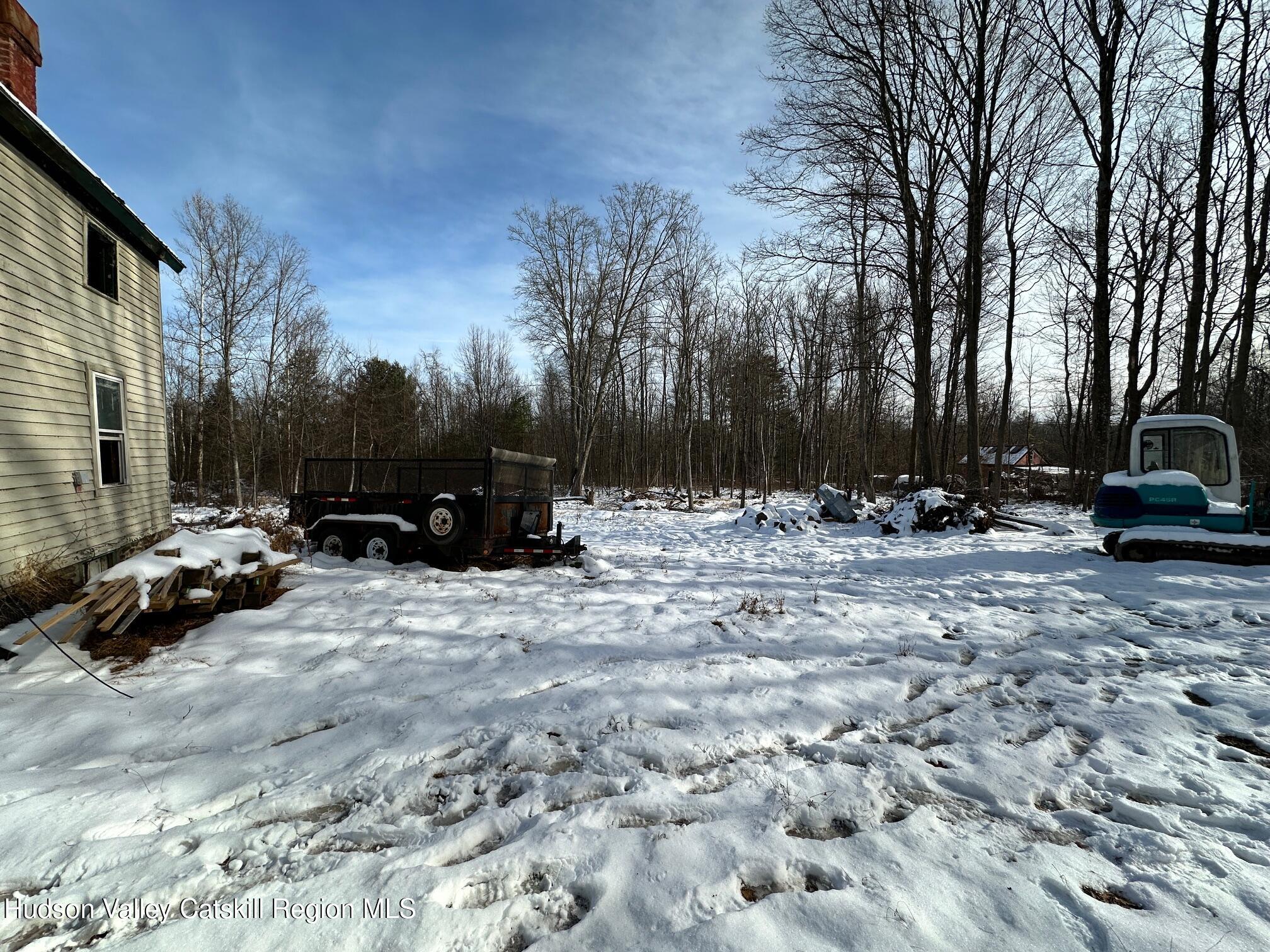 29 Reservoir Road Shokan, NY 12481 - Photo 6 of 7 a view of snow on the side of a road