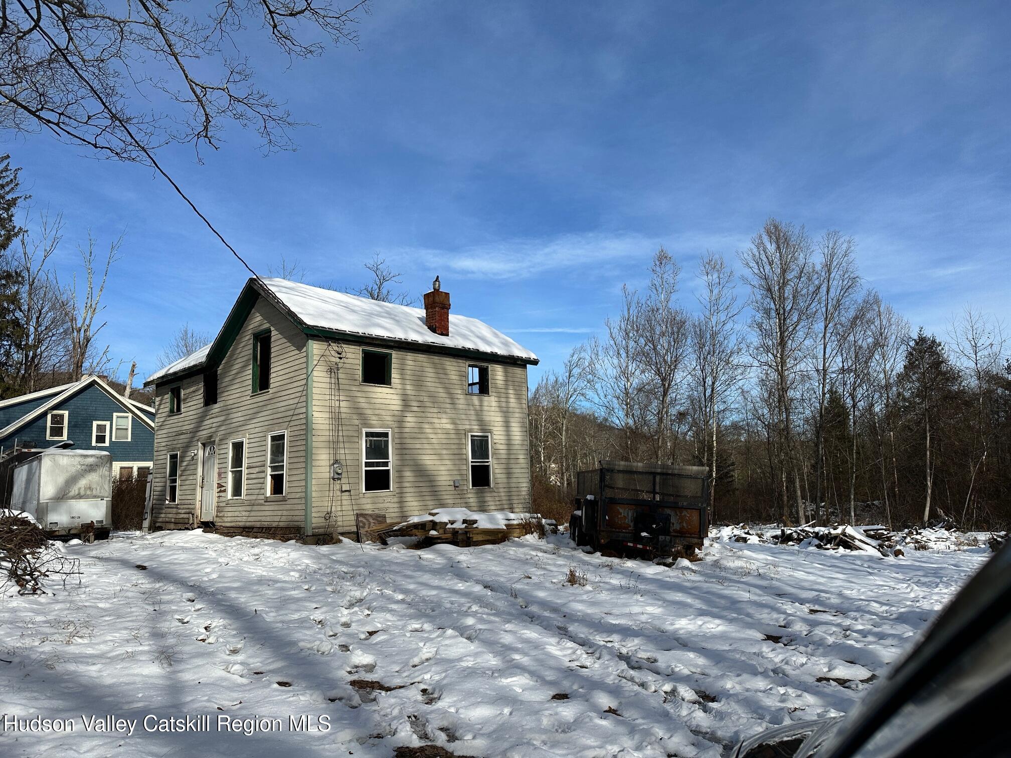 29 Reservoir Road Shokan, NY 12481 - Photo 7 of 7 a front view of a house with a yard