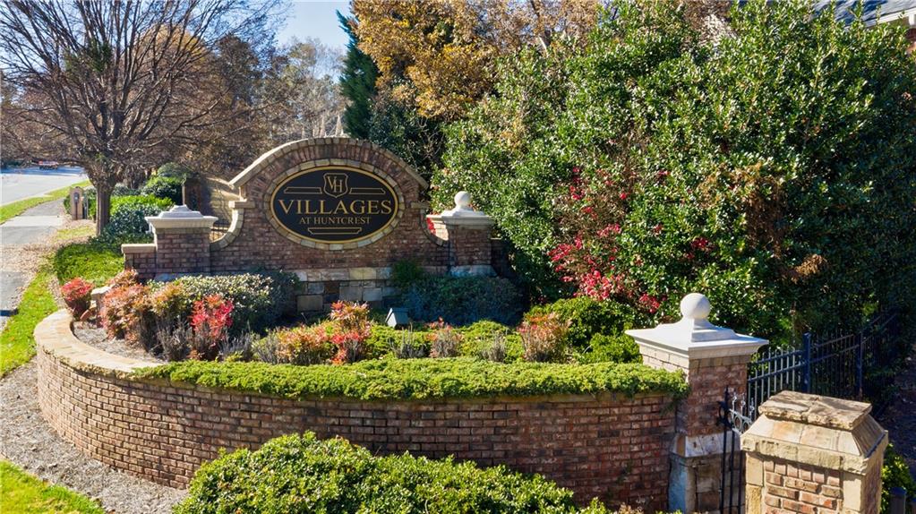 2426 Strand Avenue Lawrenceville, GA 30043 - Photo 29 of 30 a front view of a house with a yard and covered with snow