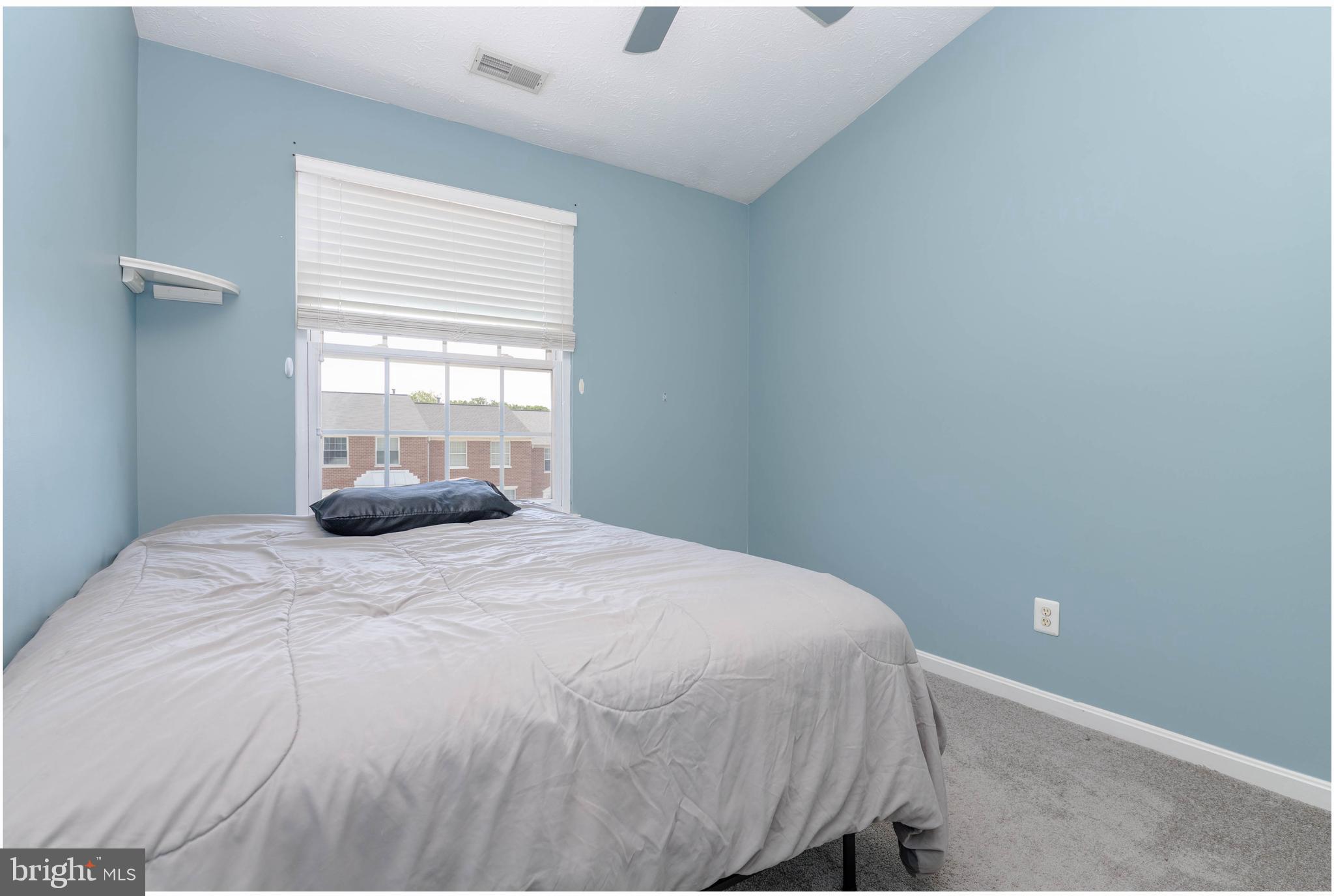 540 Doefield Court Abingdon, MD 21009 - Photo 25 of 48 a bedroom with a bed and a window