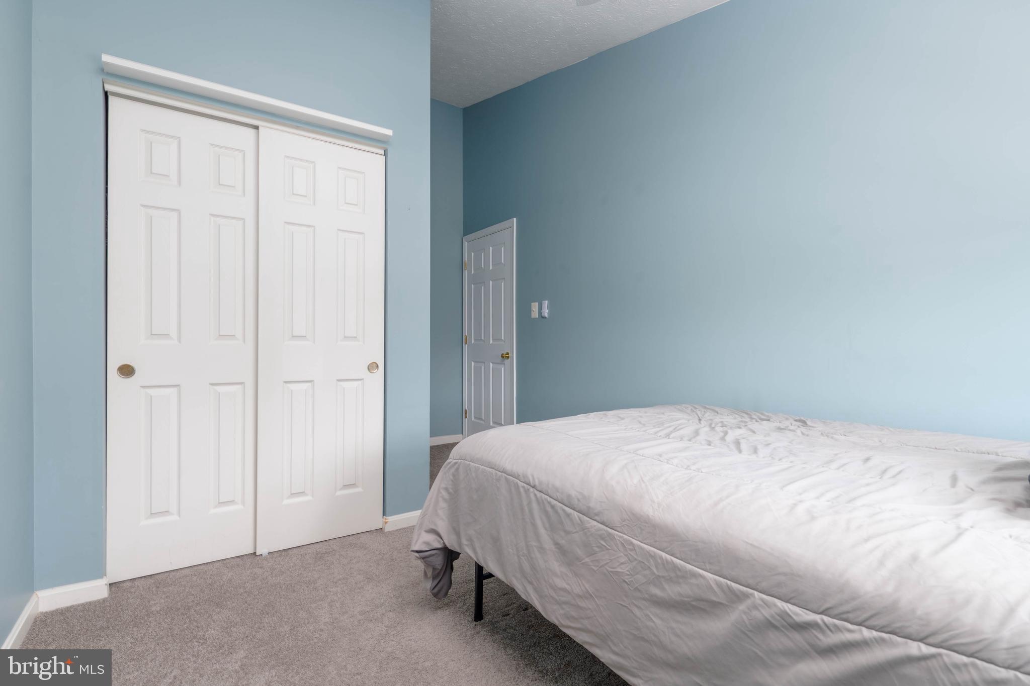 540 Doefield Court Abingdon, MD 21009 - Photo 26 of 48 a bedroom with a bed and a closet