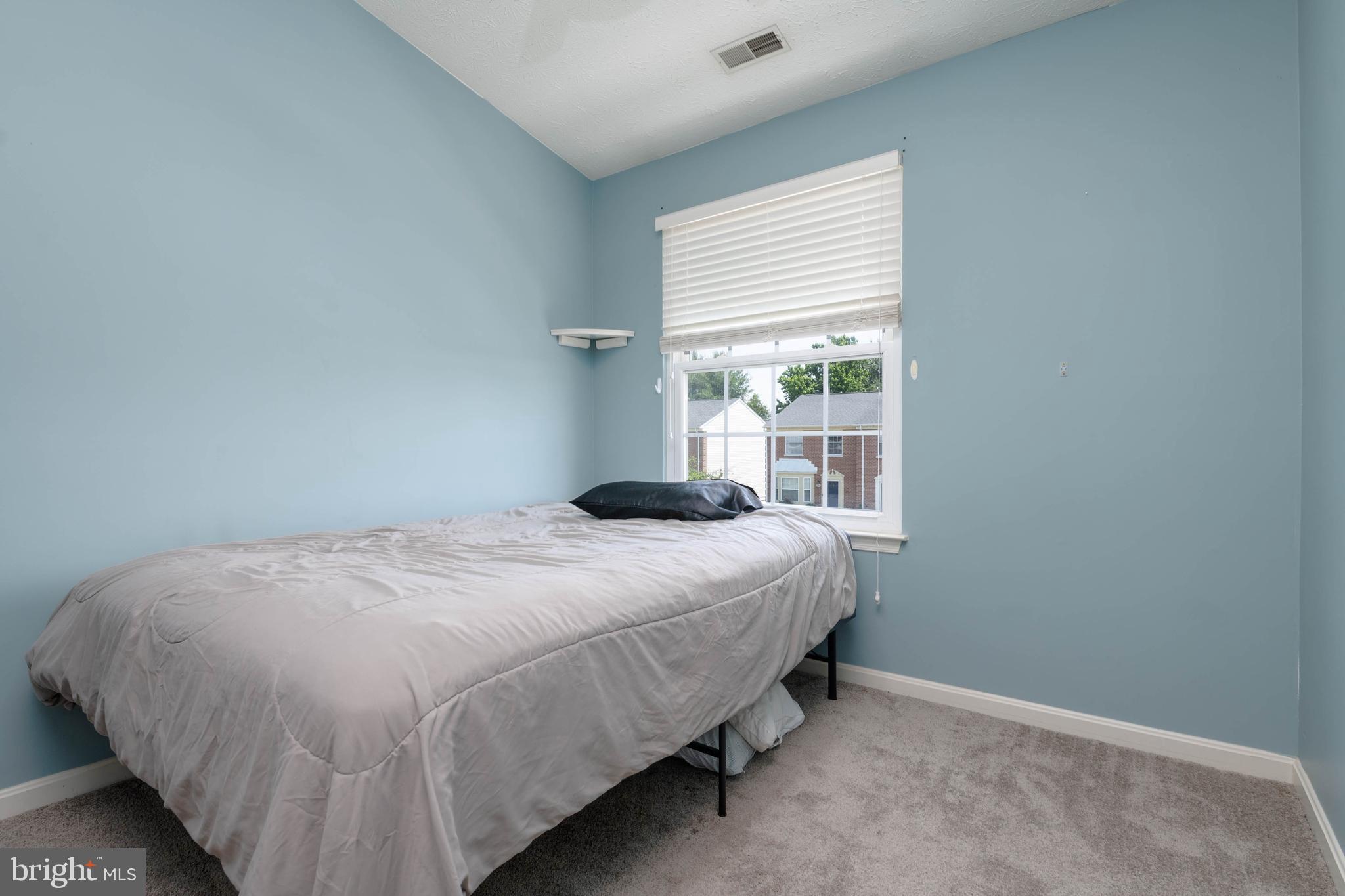 540 Doefield Court Abingdon, MD 21009 - Photo 27 of 48 a bedroom with a bed and window