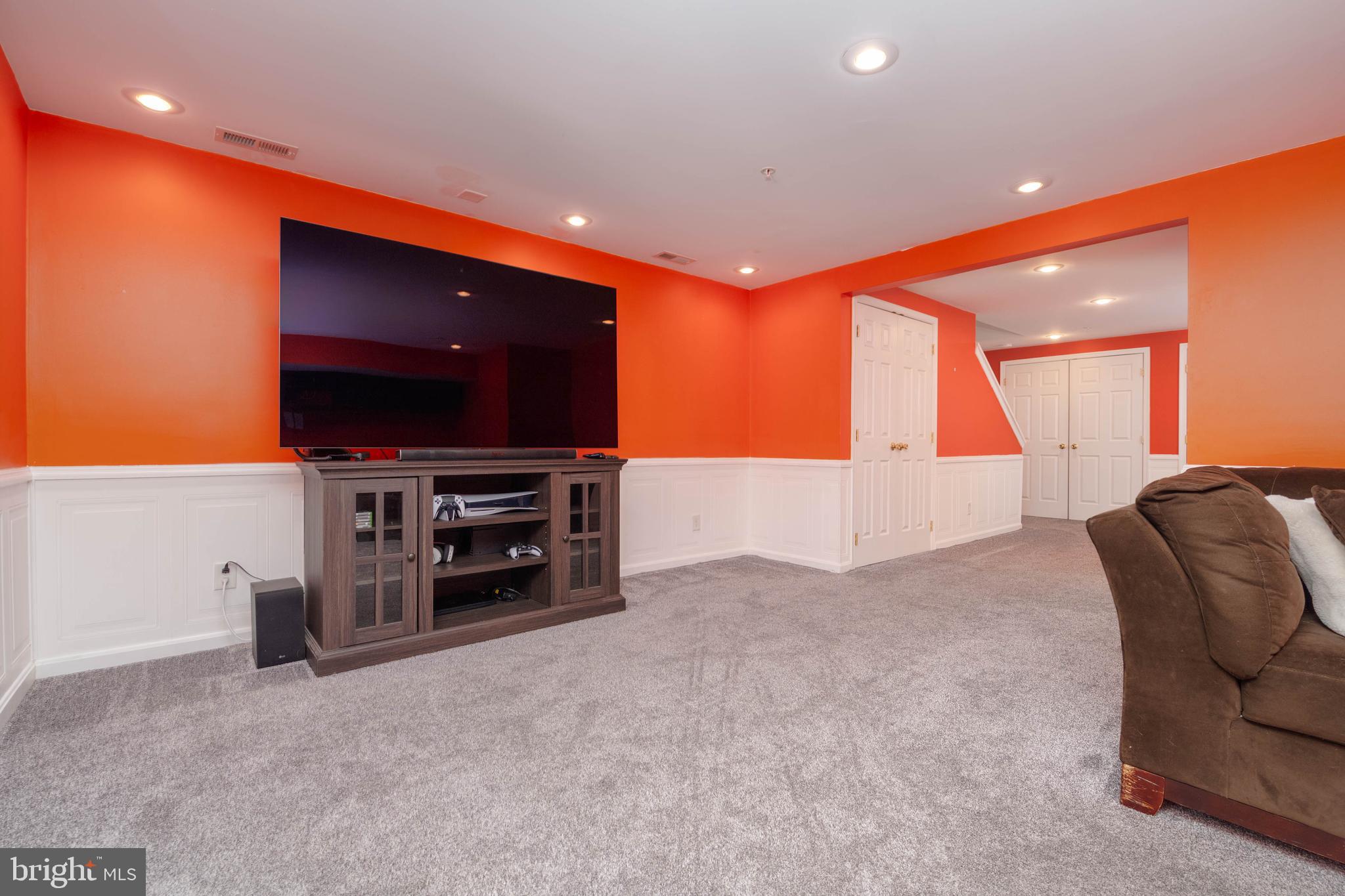 540 Doefield Court Abingdon, MD 21009 - Photo 32 of 48 a living room with furniture and a flat screen tv