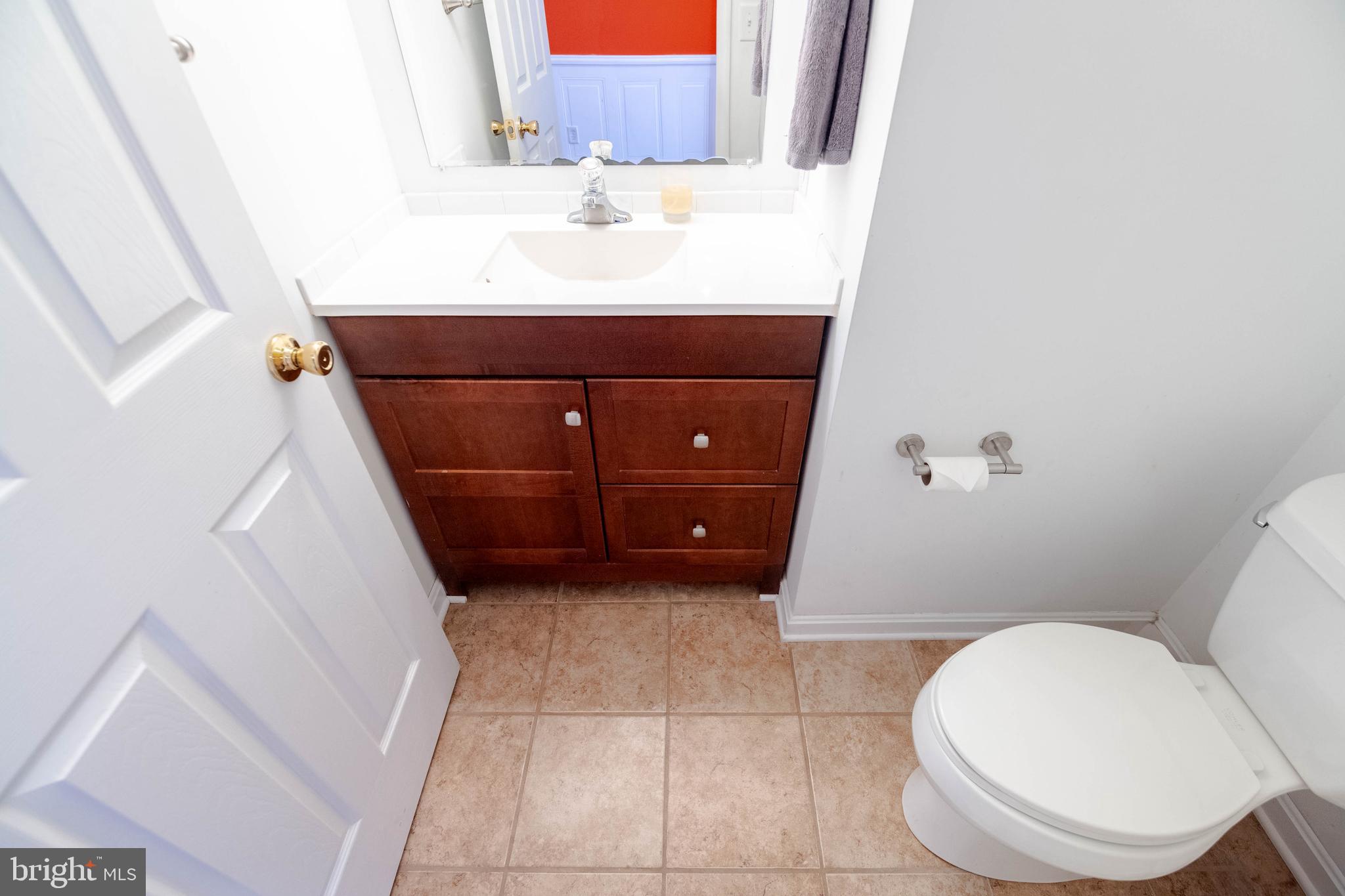 540 Doefield Court Abingdon, MD 21009 - Photo 34 of 48 a bathroom with a sink a toilet and vanity