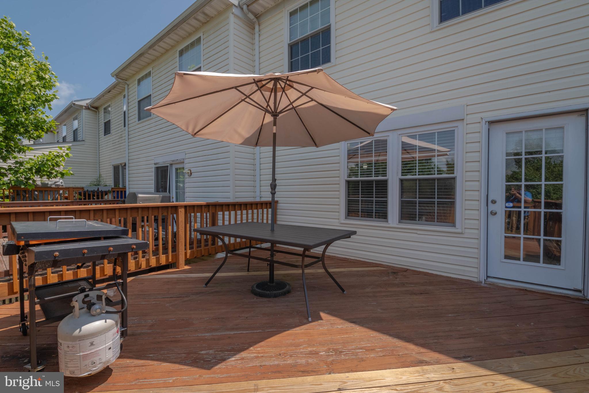540 Doefield Court Abingdon, MD 21009 - Photo 44 of 48 a wooden bench sitting in front of a building