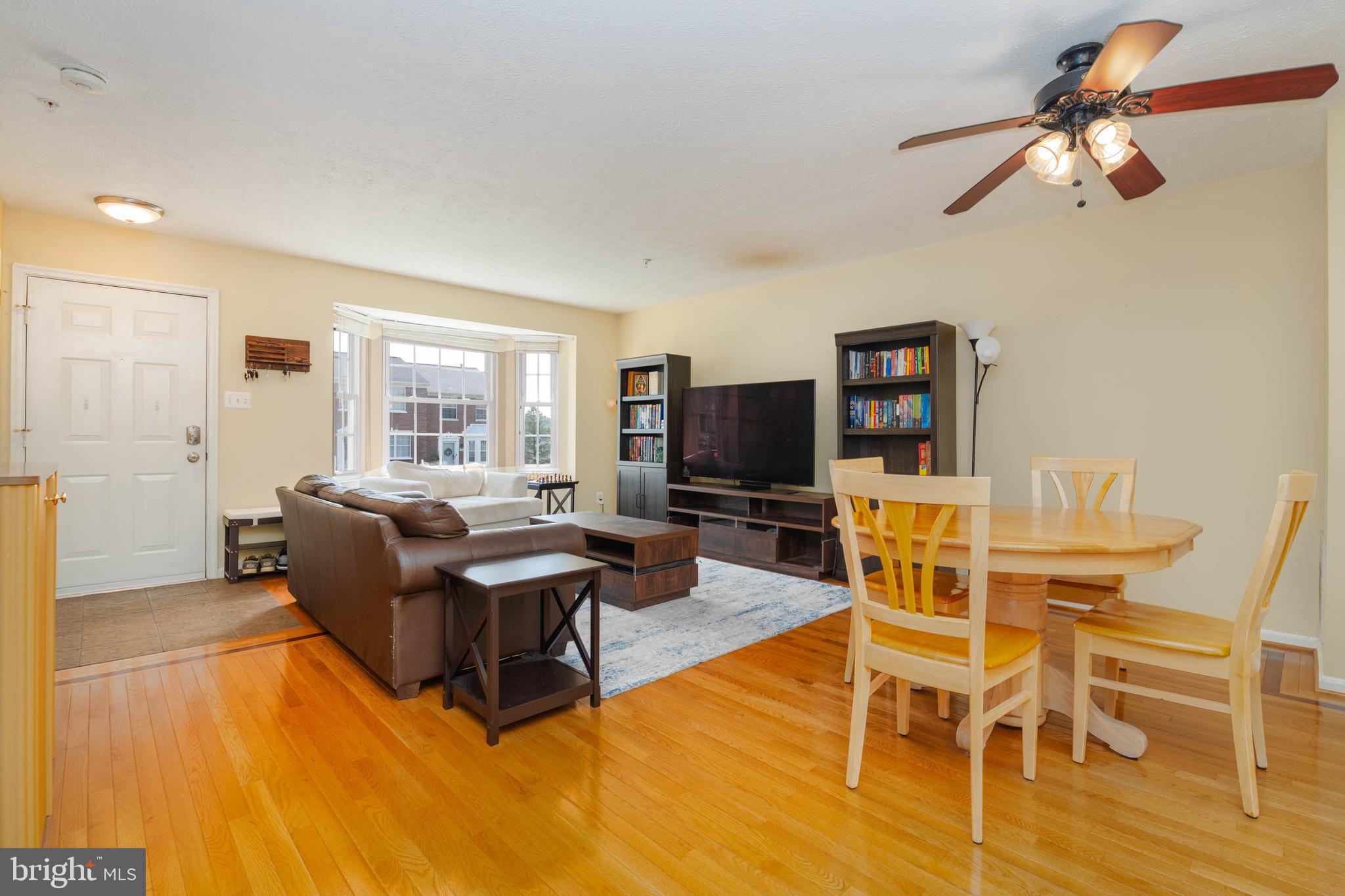 540 Doefield Court Abingdon, MD 21009 - Photo 6 of 48 a living room with furniture a flat screen tv and a window