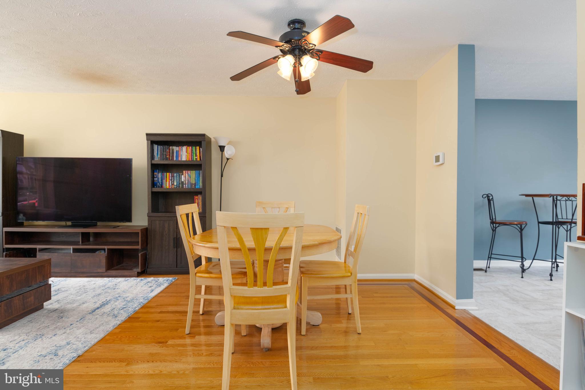 540 Doefield Court Abingdon, MD 21009 - Photo 7 of 48 a dining room with furniture and a flat screen tv