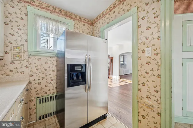 a bathroom with a shower and a sink
